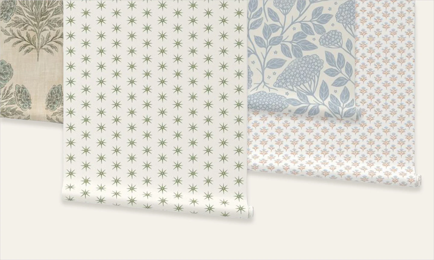 An assortment of pastel neutral wallpaper rolls
