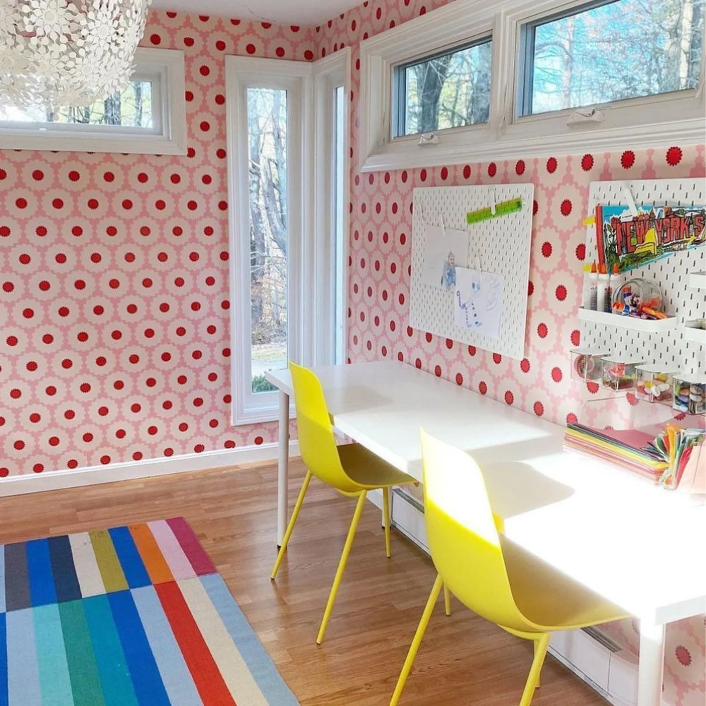 Craft room with pink retro wallpaper