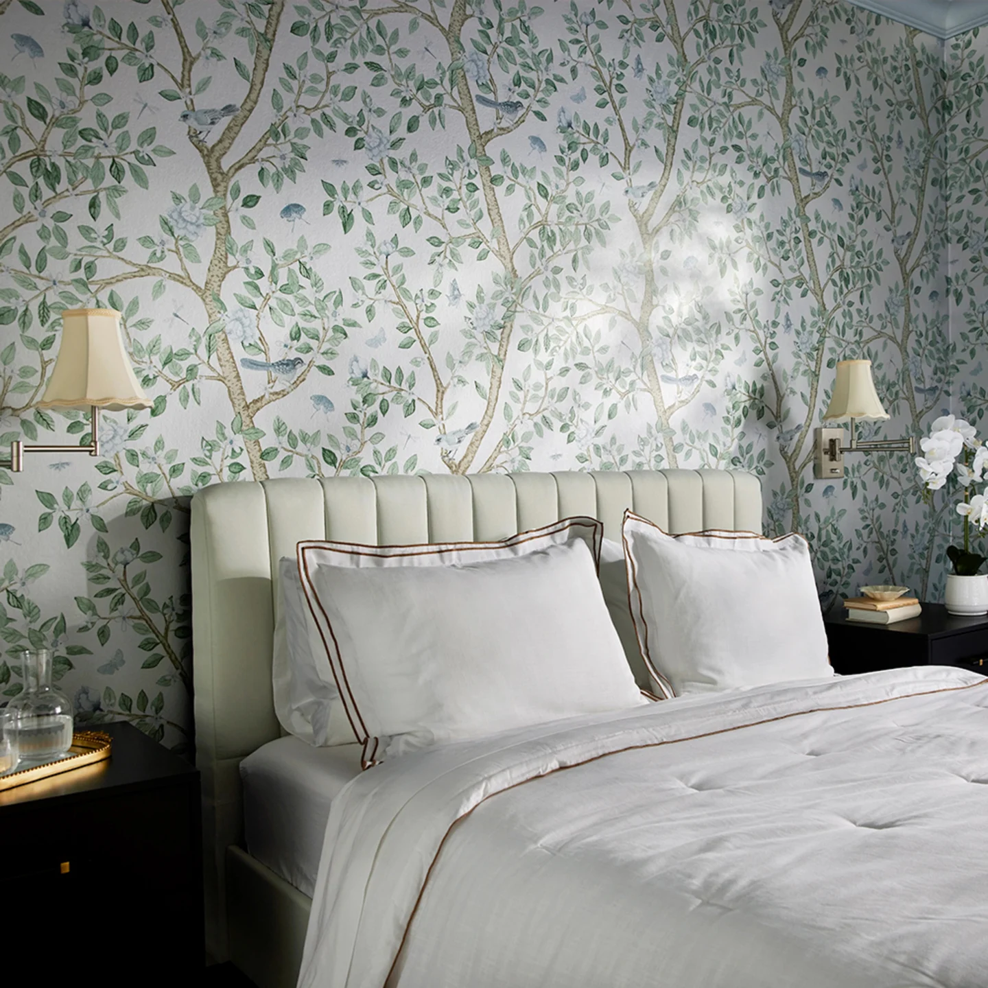 Bedroom with silver metallic branch wallpaper.