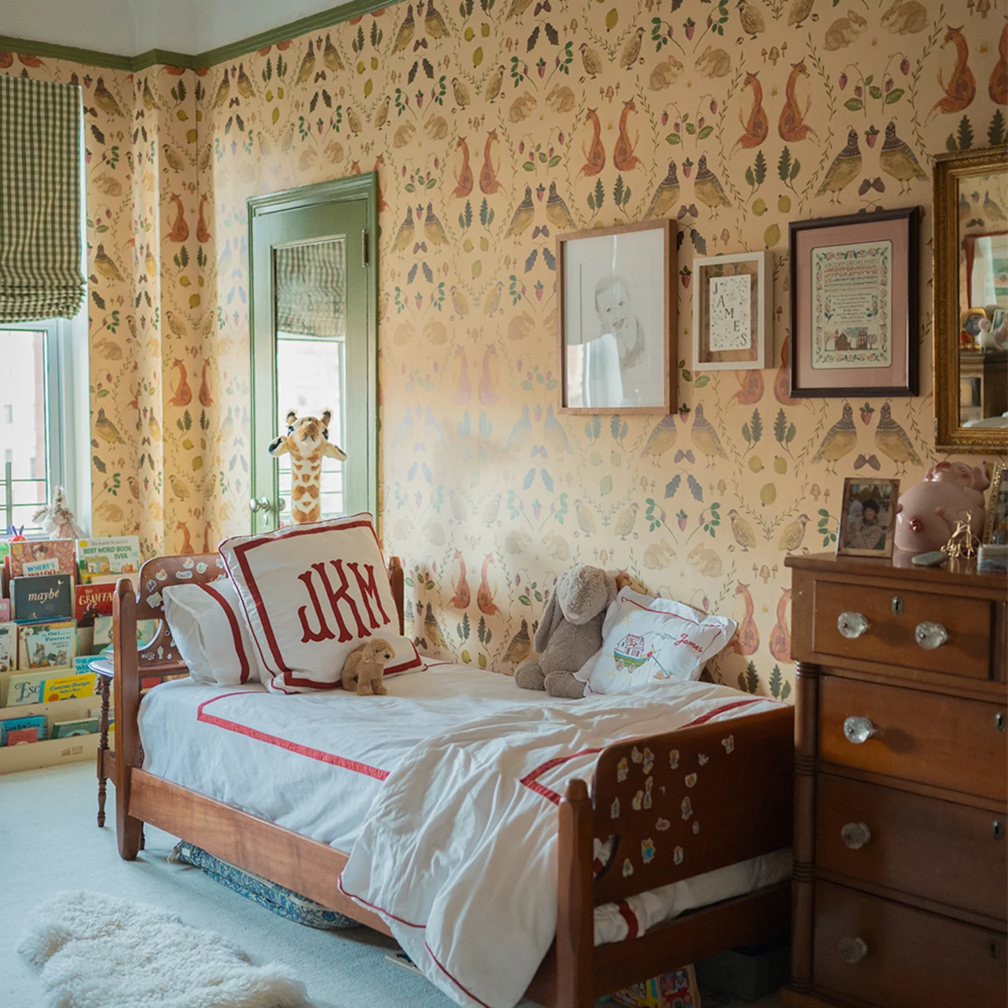 Kids room with forest friends and flora wallpaper.