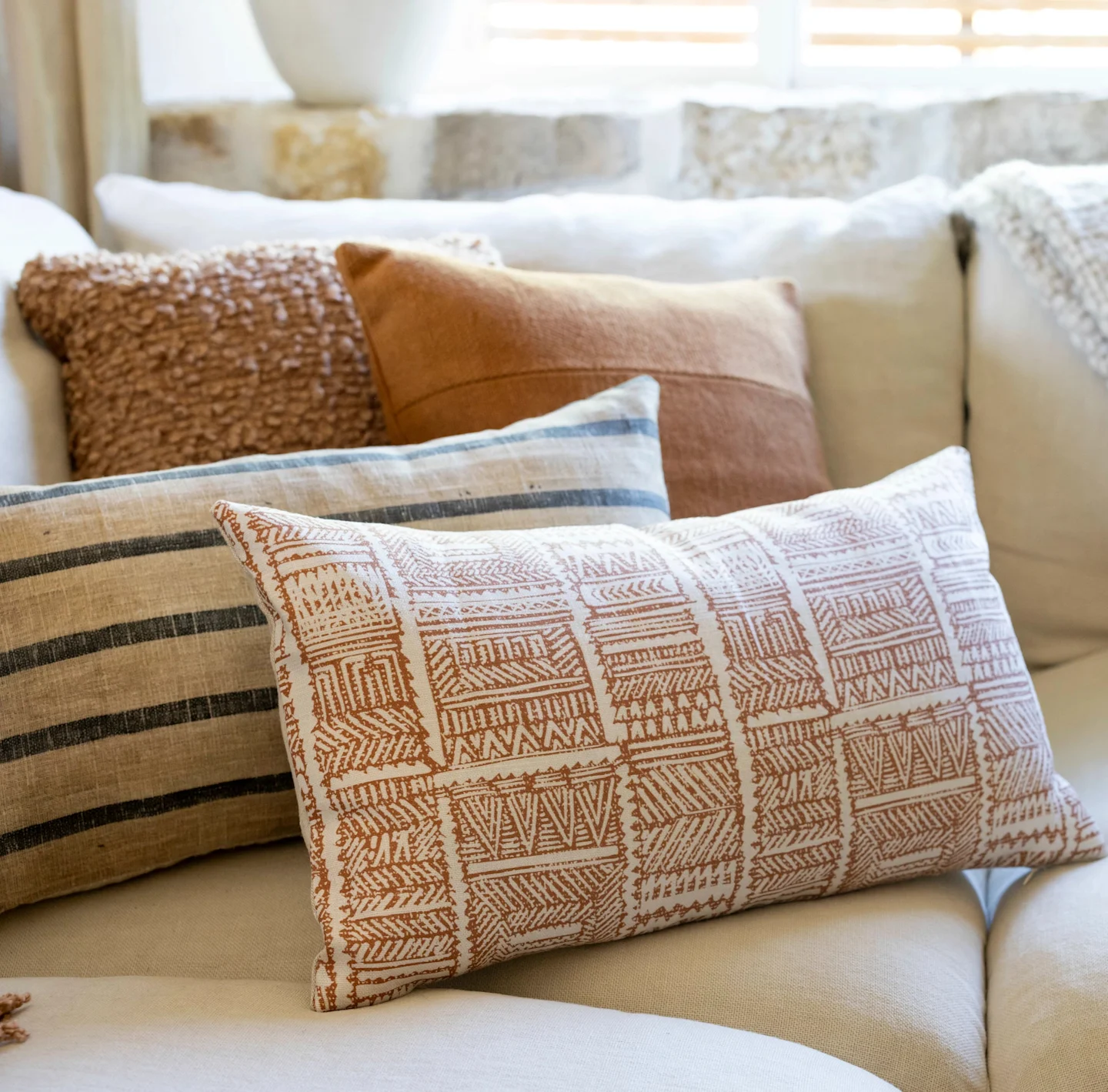 Lumbar throw pillows on couch