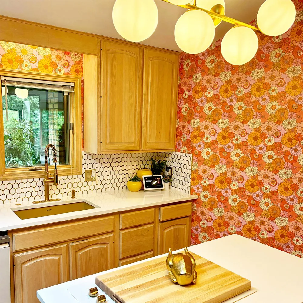 Kitchen with organge floral mid century wallpaper