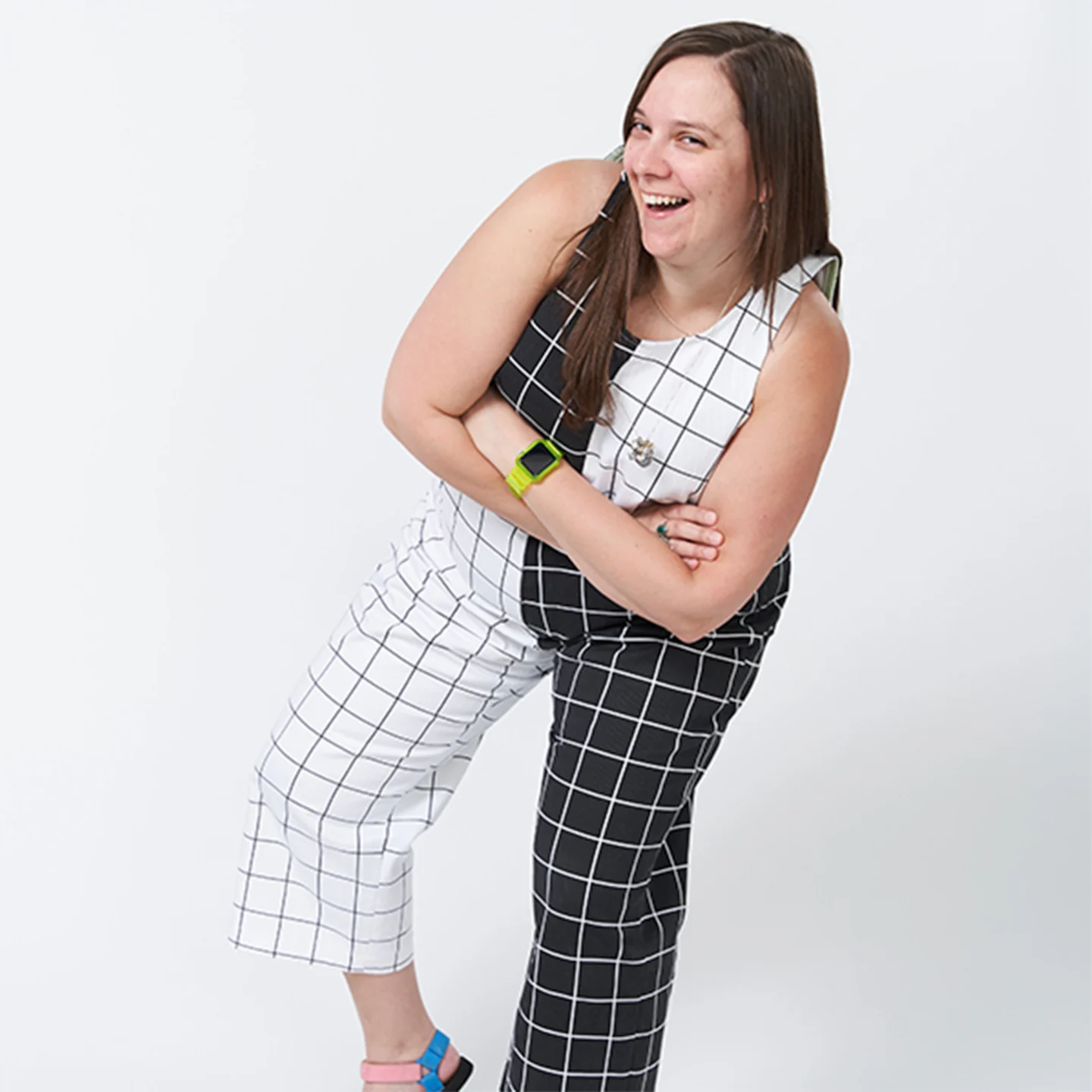 Spoonflower employee Sarah B wearing black and white grid pattern denim pants and top.