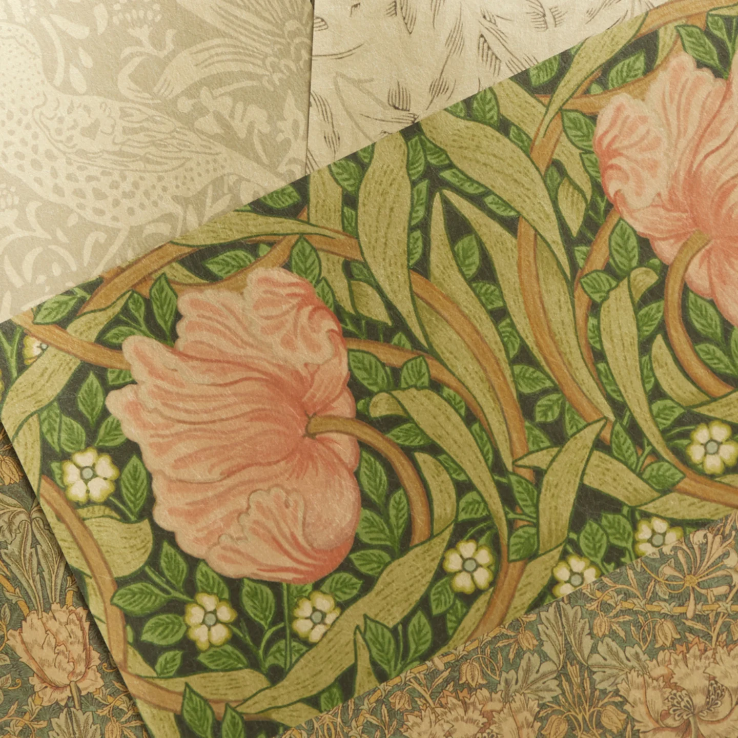 Heritage designs on gold metallic wallpaper