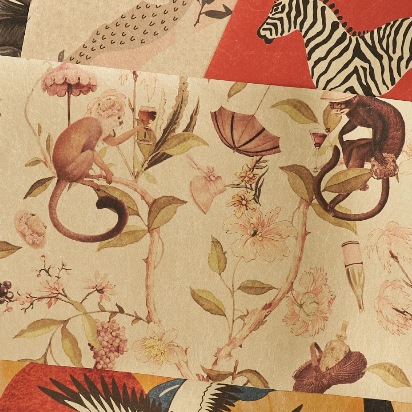 Animal designs on gold metallic wallpaper