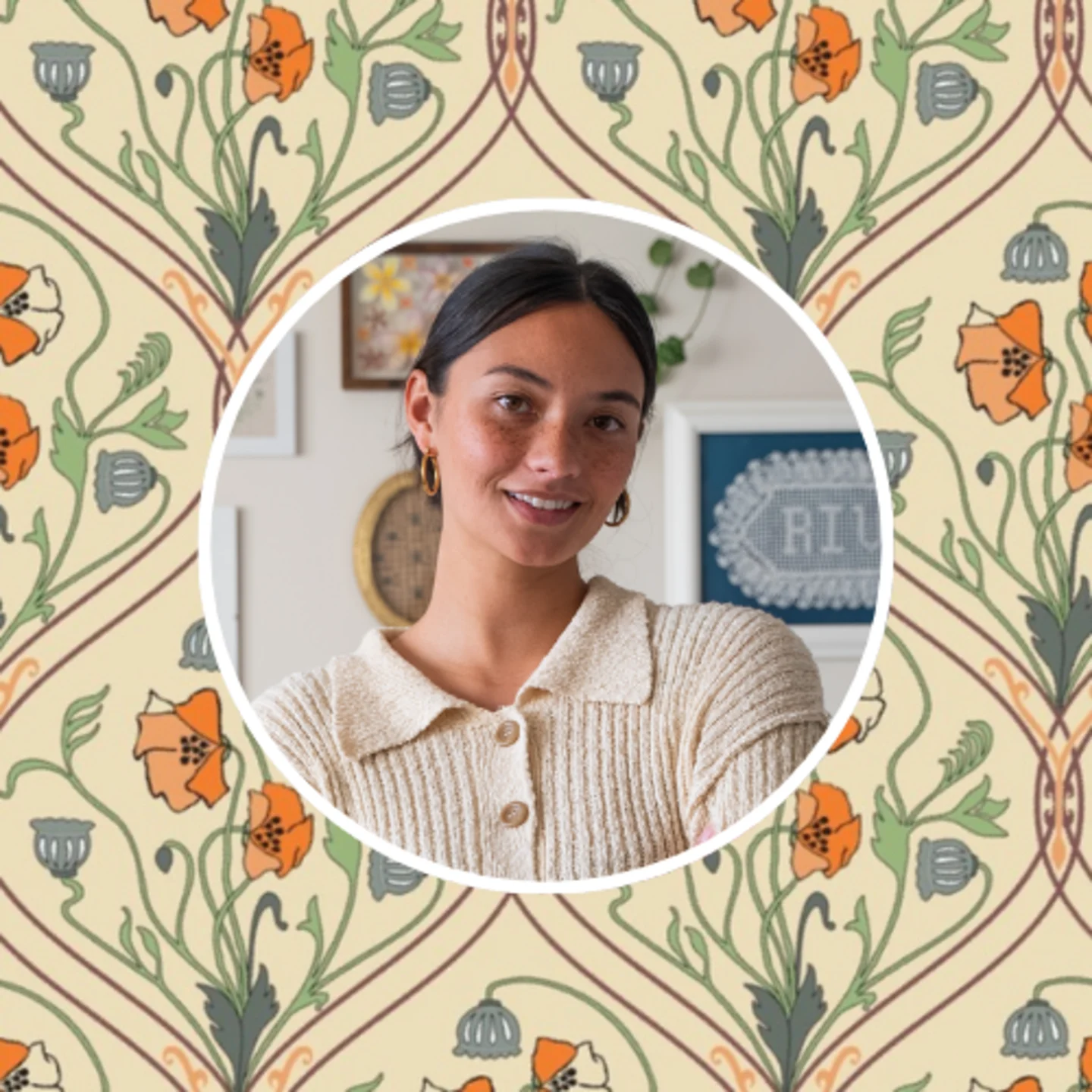 Mya Riviera of Mya Kaye Made in front of an Art Nouveau style design.